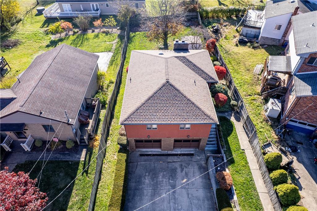 2002 Michael Avenue Irwin, PA 15642 - Photo 45 of 49 an aerial view of a house with a yard and potted plants
