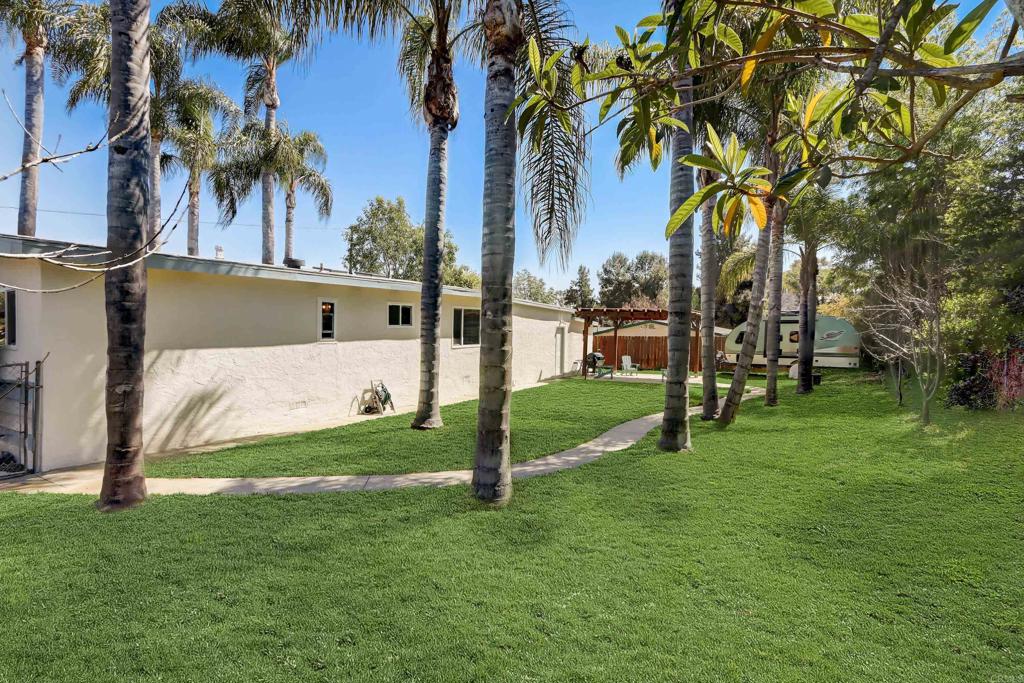 136 Hannalei Drive Vista, CA 92083 - Photo 21 of 32 a view of a park with a tree