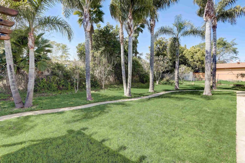 136 Hannalei Drive Vista, CA 92083 - Photo 22 of 32 a view of a park with palm trees