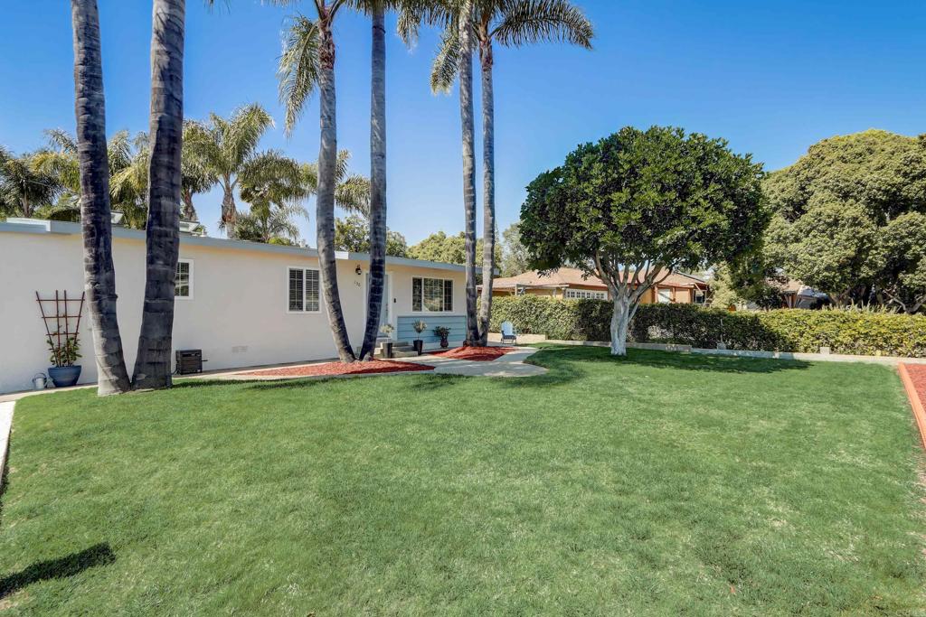 136 Hannalei Drive Vista, CA 92083 - Photo 4 of 32 a view of a backyard with palm trees