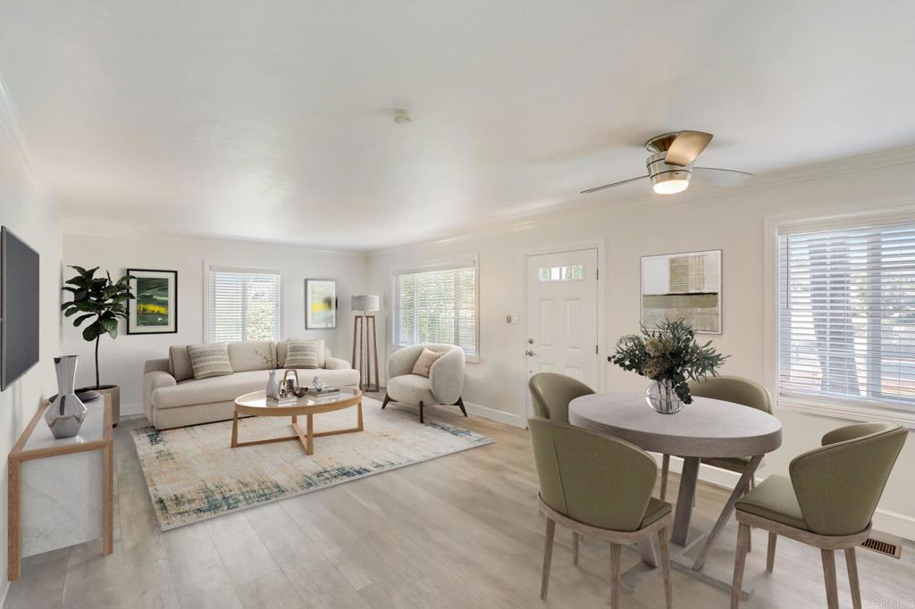 136 Hannalei Drive Vista, CA 92083 - Photo 6 of 32 a living room with furniture and a chandelier