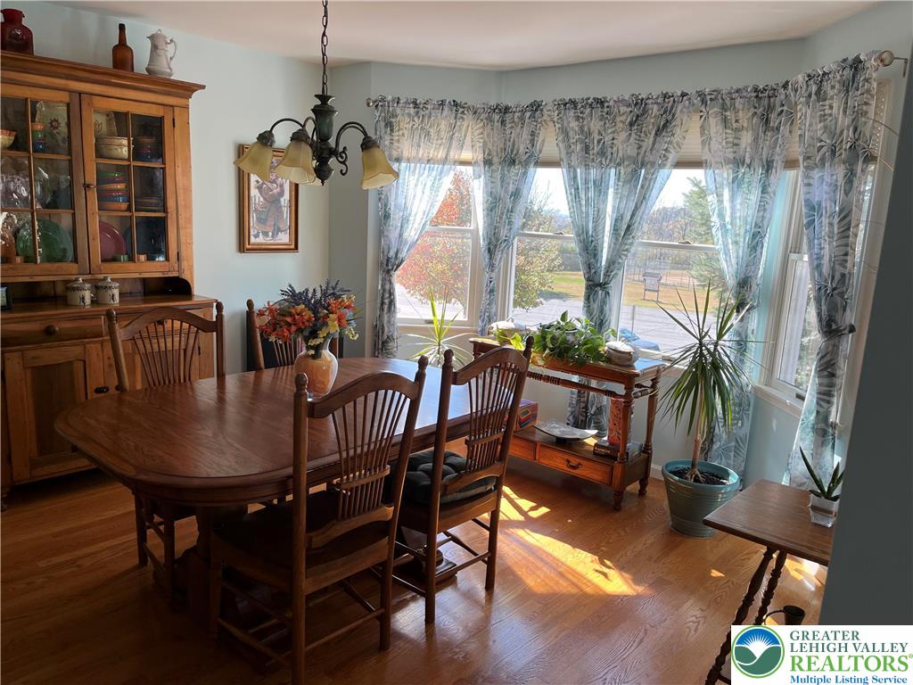 205 Spyglass Hill Road Bath, PA 18014 - Photo 12 of 51 a view of a dining room with furniture window and outside view