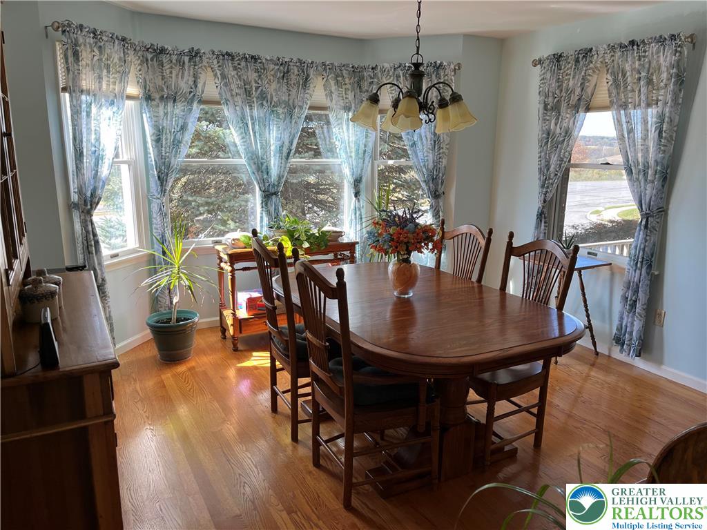 205 Spyglass Hill Road Bath, PA 18014 - Photo 13 of 51 a view of a dining room with furniture and window