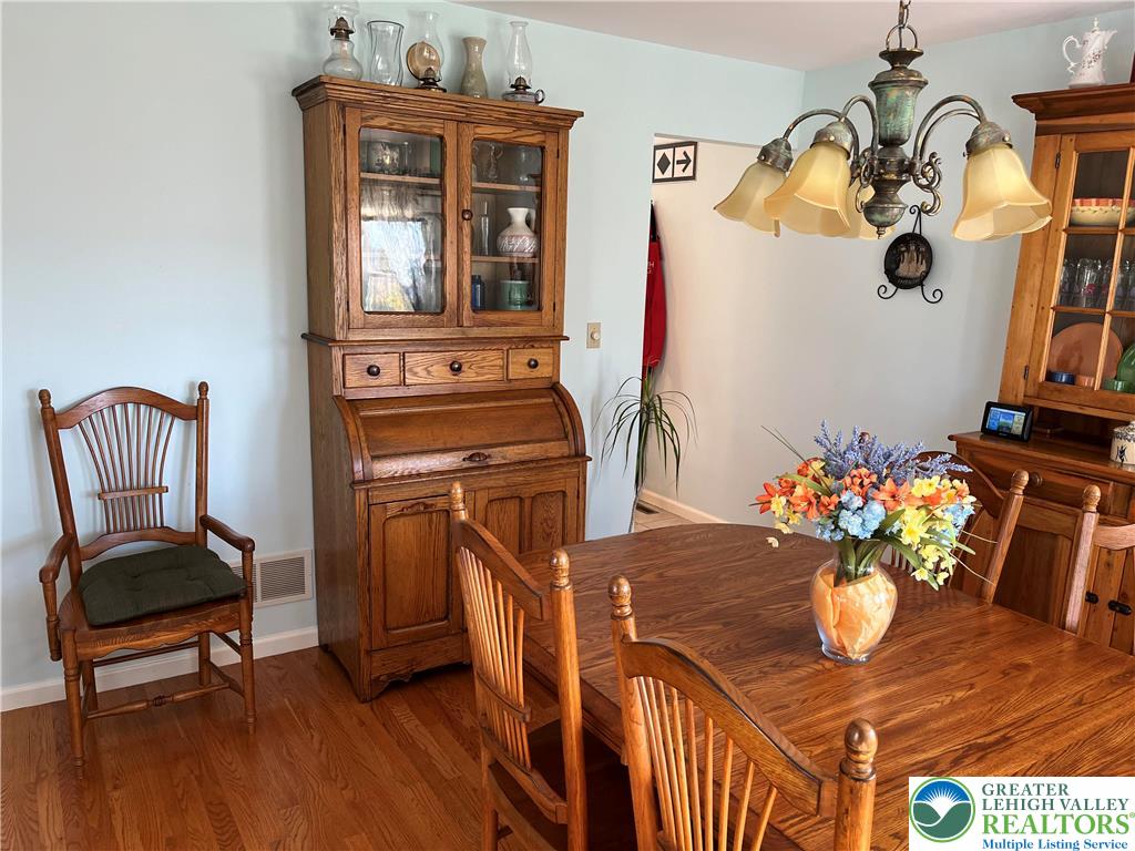205 Spyglass Hill Road Bath, PA 18014 - Photo 14 of 51 a living room with furniture and wooden floor