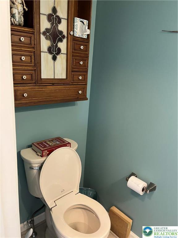 205 Spyglass Hill Road Bath, PA 18014 - Photo 15 of 51 a bathroom with a toilet and a sink