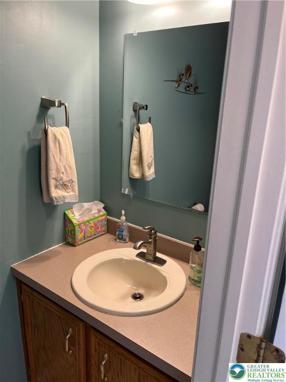 205 Spyglass Hill Road Bath, PA 18014 - Photo 16 of 51 a bathroom with a sink and a mirror