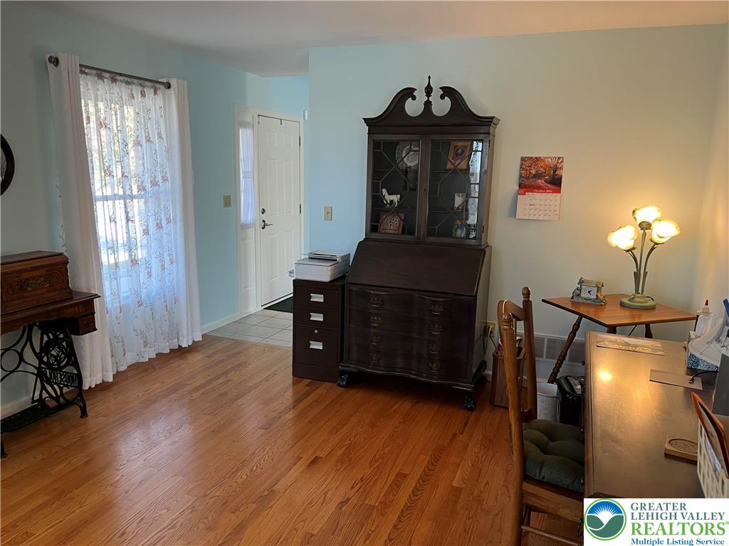 205 Spyglass Hill Road Bath, PA 18014 - Photo 2 of 51 a living room with furniture and wooden floor