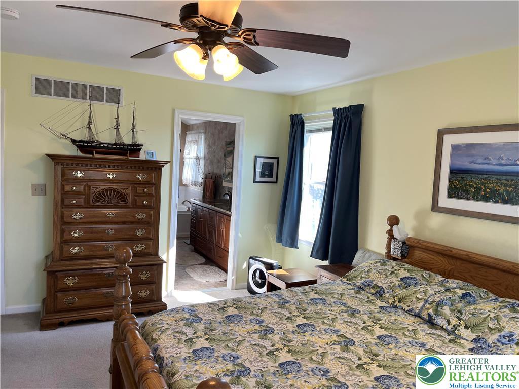 205 Spyglass Hill Road Bath, PA 18014 - Photo 21 of 51 a bedroom with a bed and a television