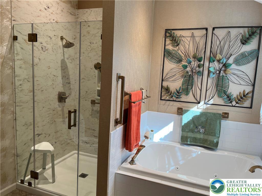 205 Spyglass Hill Road Bath, PA 18014 - Photo 24 of 51 a bathroom with a tub and a shower