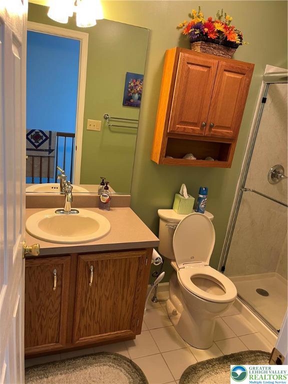 205 Spyglass Hill Road Bath, PA 18014 - Photo 29 of 51 a bathroom with a sink mirror vanity and toilet