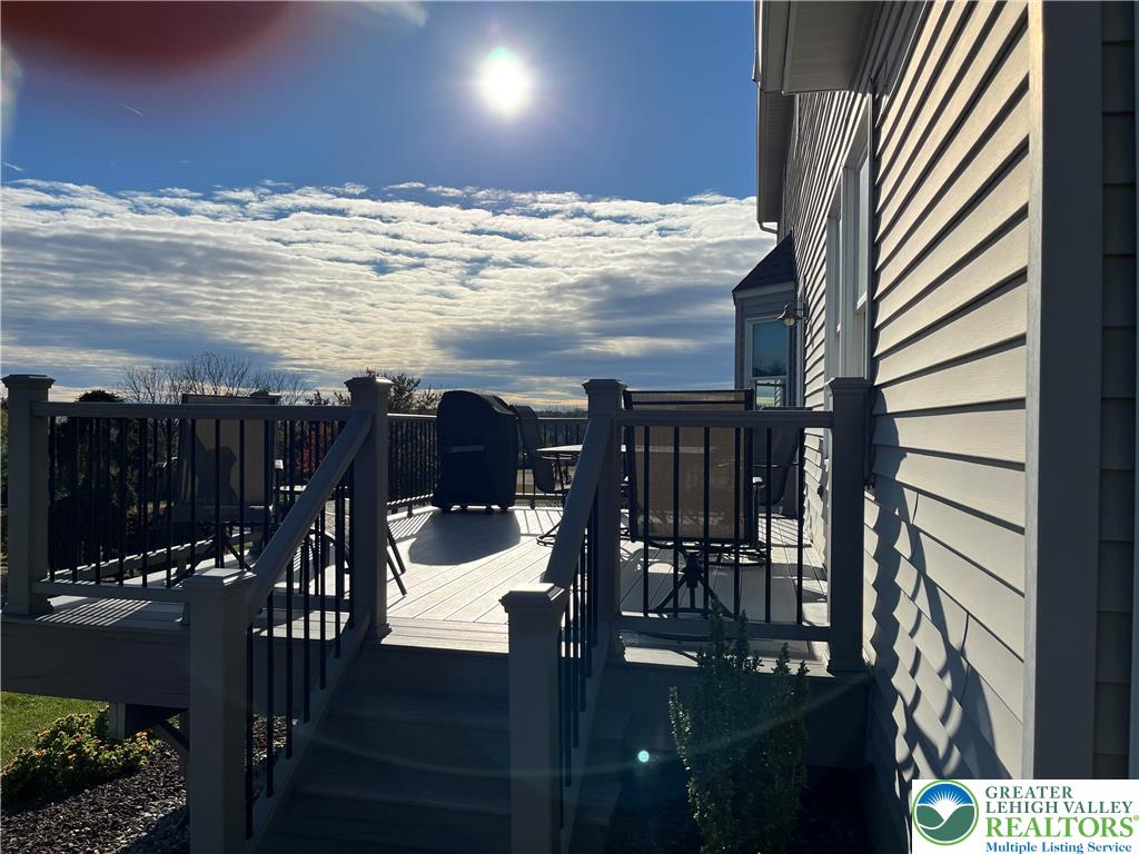 205 Spyglass Hill Road Bath, PA 18014 - Photo 40 of 51 a view of a balcony with chairs and wooden floor