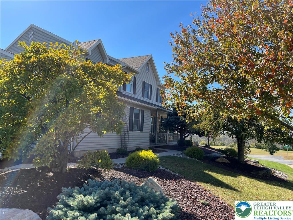 205 Spyglass Hill Road Bath, PA 18014 - Photo 47 of 51 a view of a house with backyard and sitting area