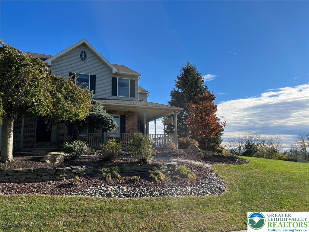 205 Spyglass Hill Road Bath, PA 18014 - Photo 48 of 51 a front view of a house with garden