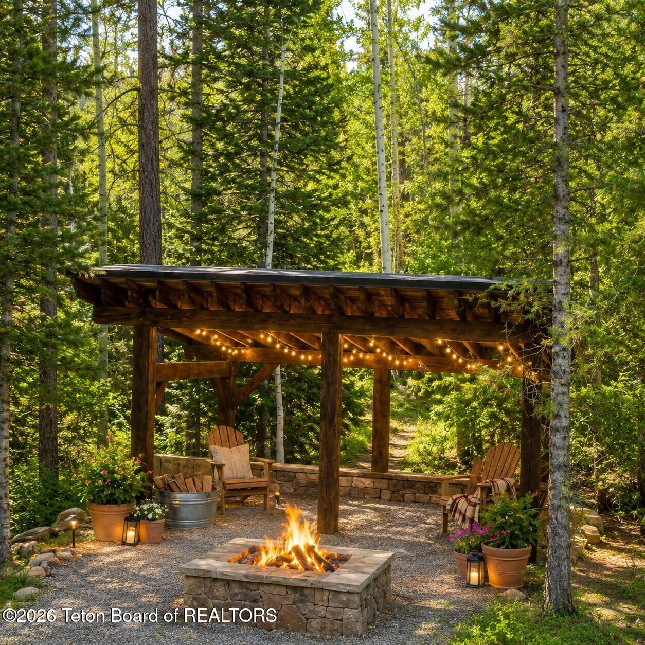 5727 Forest Ridge Road Victor, ID 83455 - Photo 8 of 80 Outdoor firepit area - Virtual Staging S