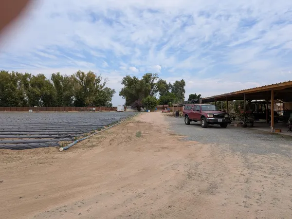 a view of a lake with a big yard
