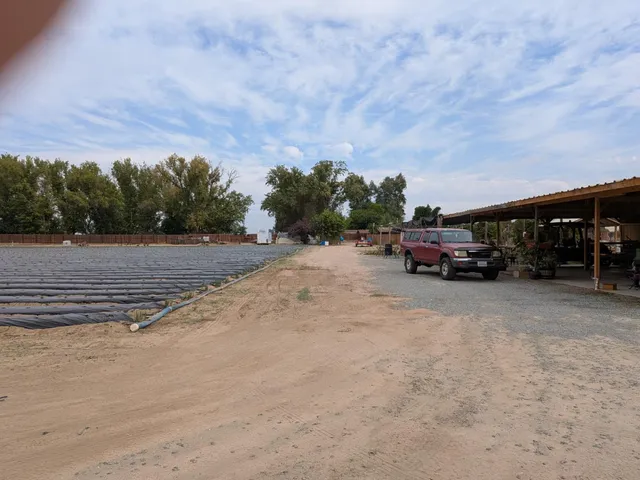 a view of a lake with a big yard