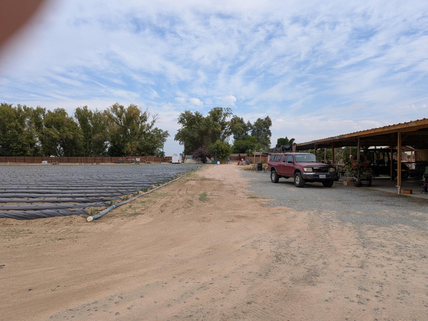 284 South Temperance Avenue Fresno, CA 93737 - Photo 11 of 23 a car parked on the side of the road