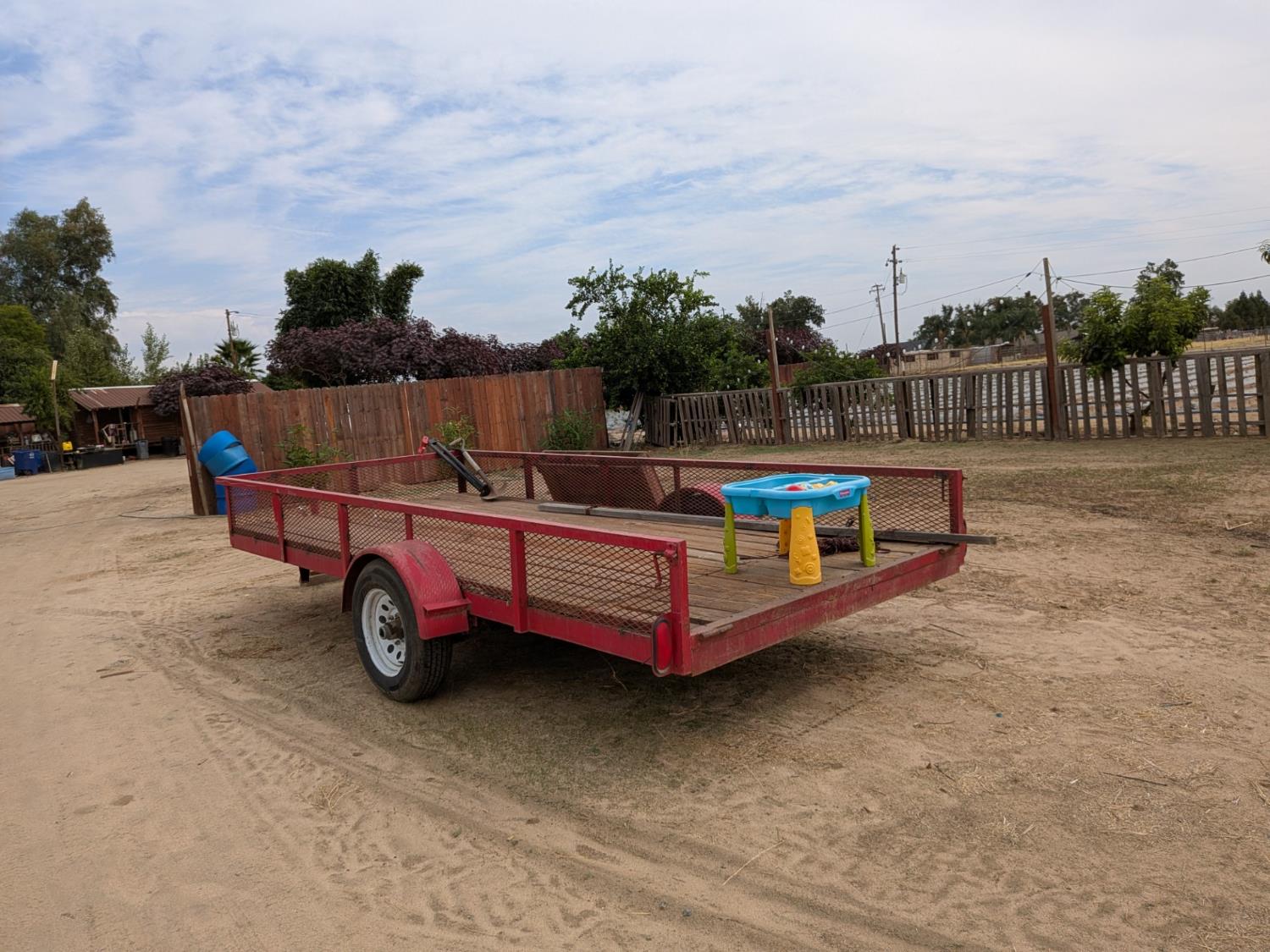 284 South Temperance Avenue Fresno, CA 93737 - Photo 20 of 23 a view of a roof deck with a table and chairs