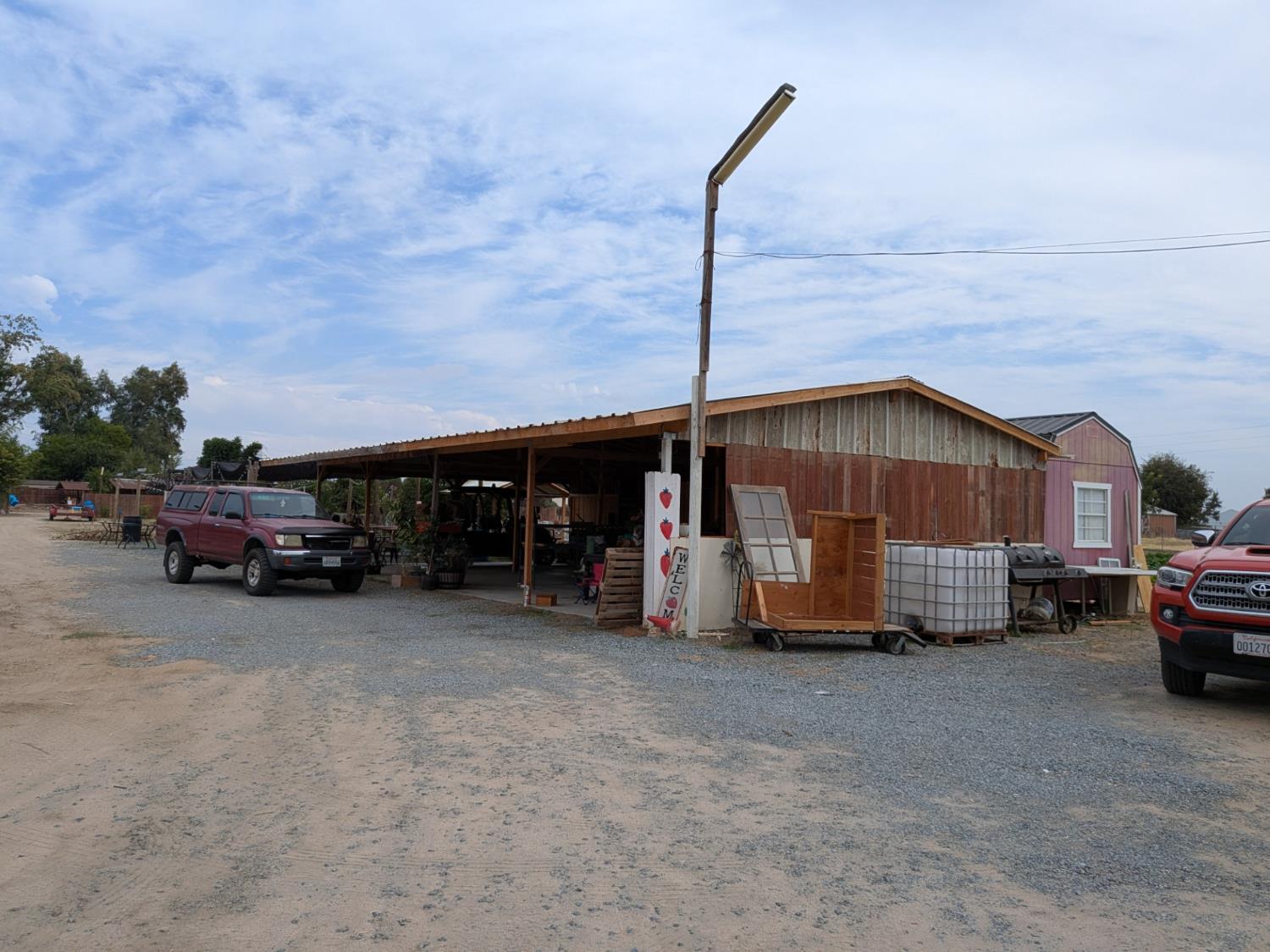 284 South Temperance Avenue Fresno, CA 93737 - Photo 7 of 23 a car parked in front of a house