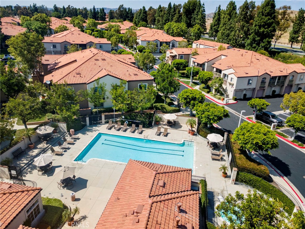 215 South Cross Creek Road, Unit L Orange, CA 92869 - Photo 41 of 50 an aerial view of a house with swimming pool patio and outdoor seating