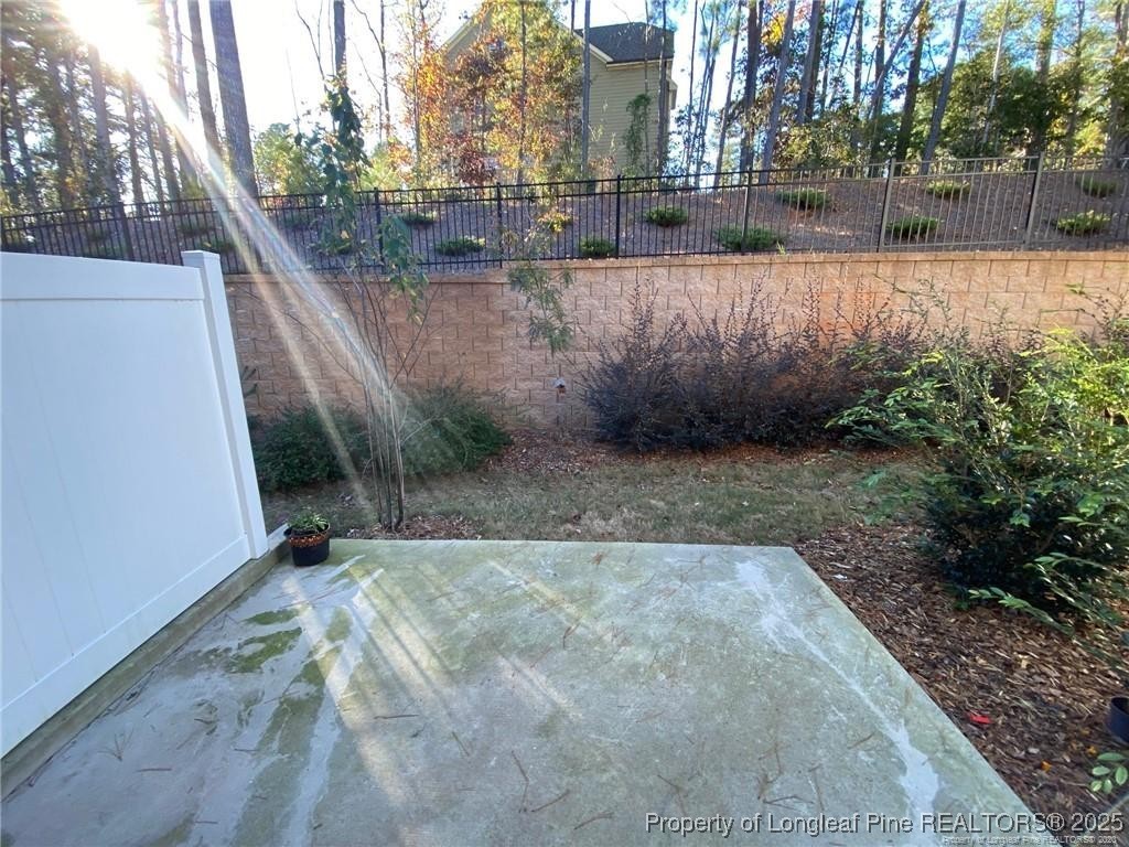 1206 Wingstem Place Raleigh, NC 27607 - Photo 9 of 17 a view of a yard