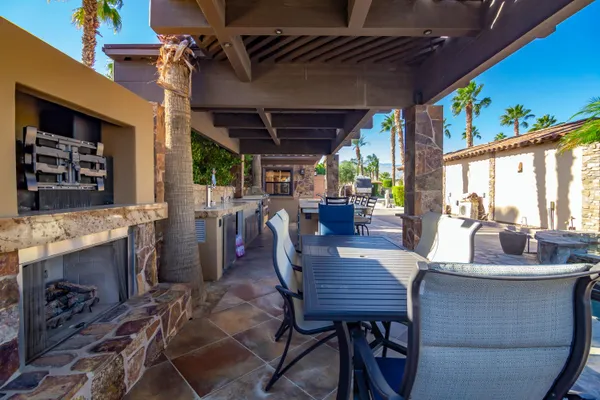 a outdoor dining space with furniture