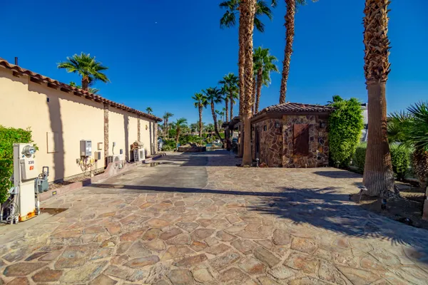 a view of a street with a building in the background