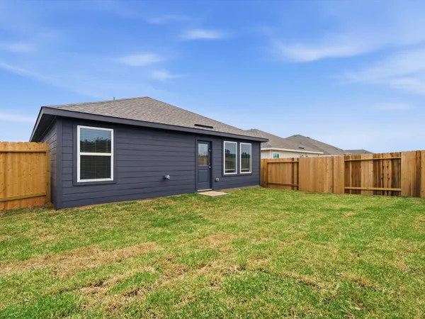 a house view with a garden space