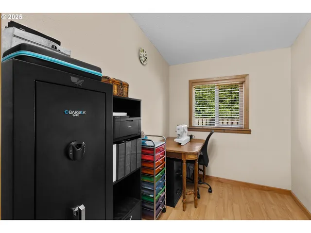 a view of a workspace with furniture