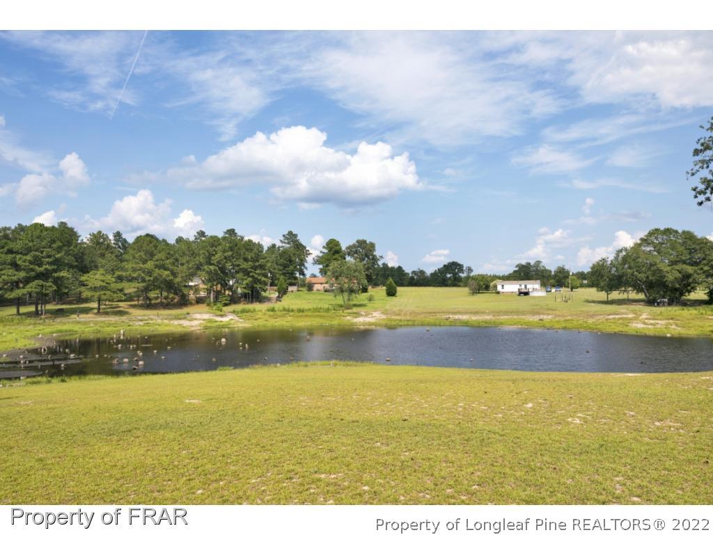 5253 Lobelia Road Vass, NC 28394 - Photo 22 of 28 a view of an ocean and beach