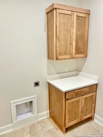 a utility room with a sink