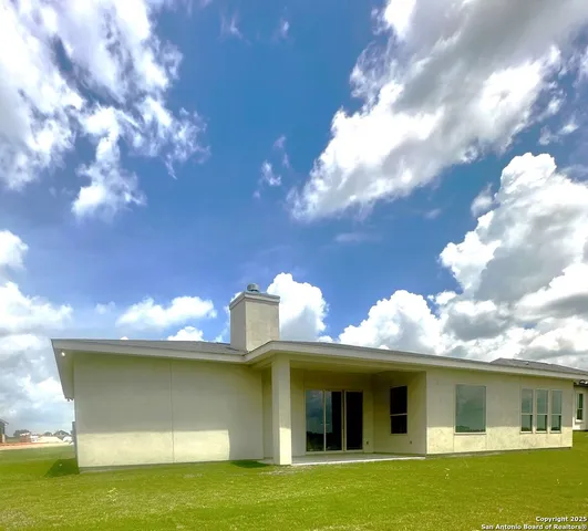 a view of a house with a swimming pool