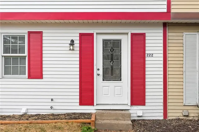 a view of a red door of the house
