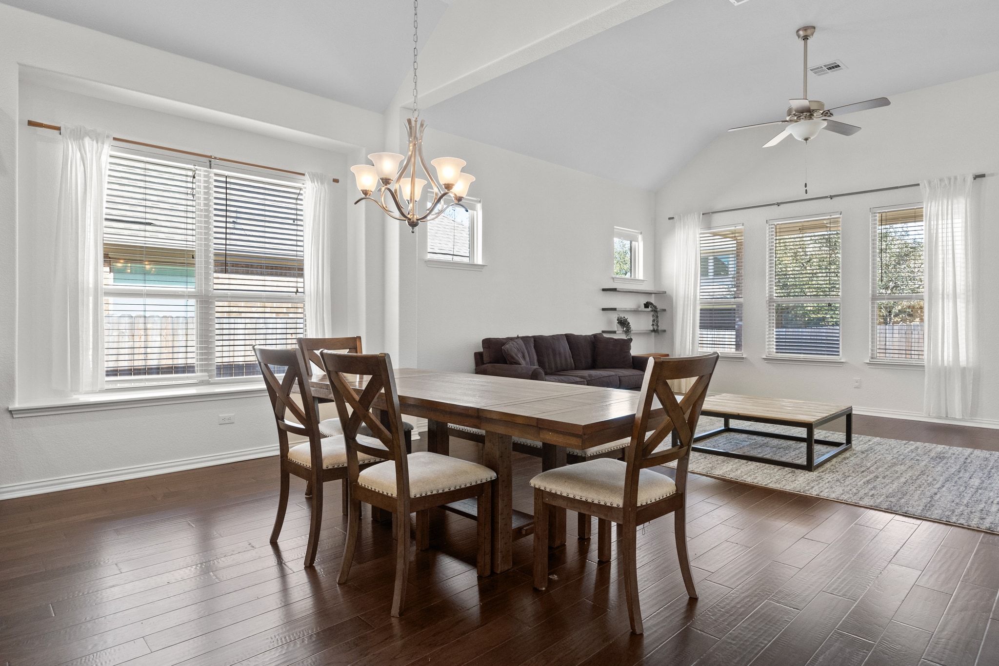 228 Sangiovese Leander, TX 78641 - Photo 10 of 32 a view of a dining room with furniture window and wooden floor
