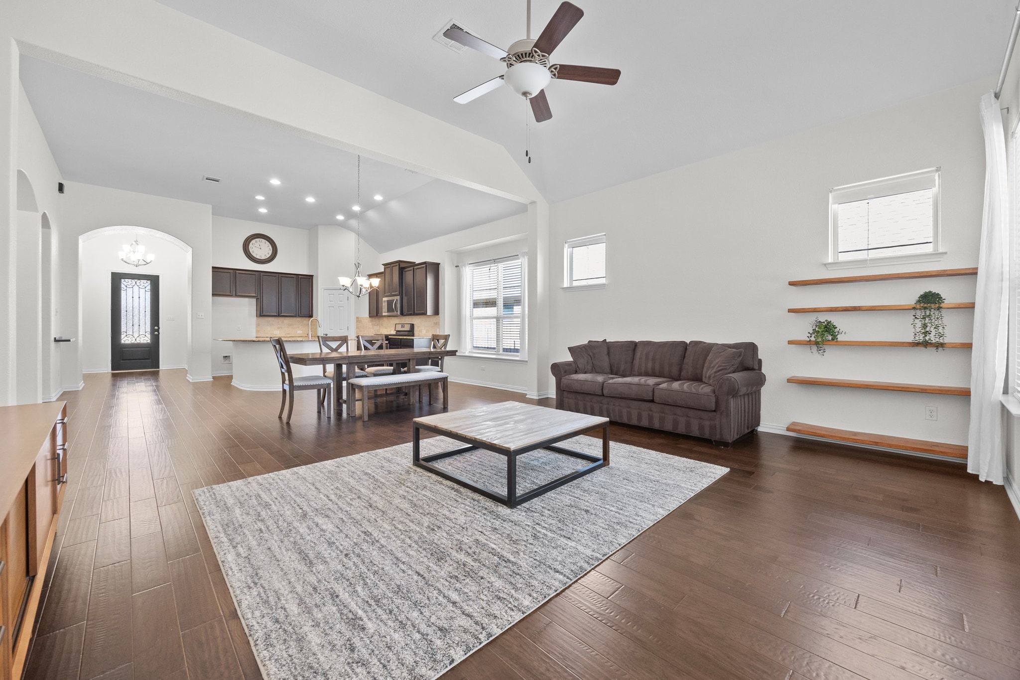 228 Sangiovese Leander, TX 78641 - Photo 7 of 32 a living room with furniture or couch and a wooden floor