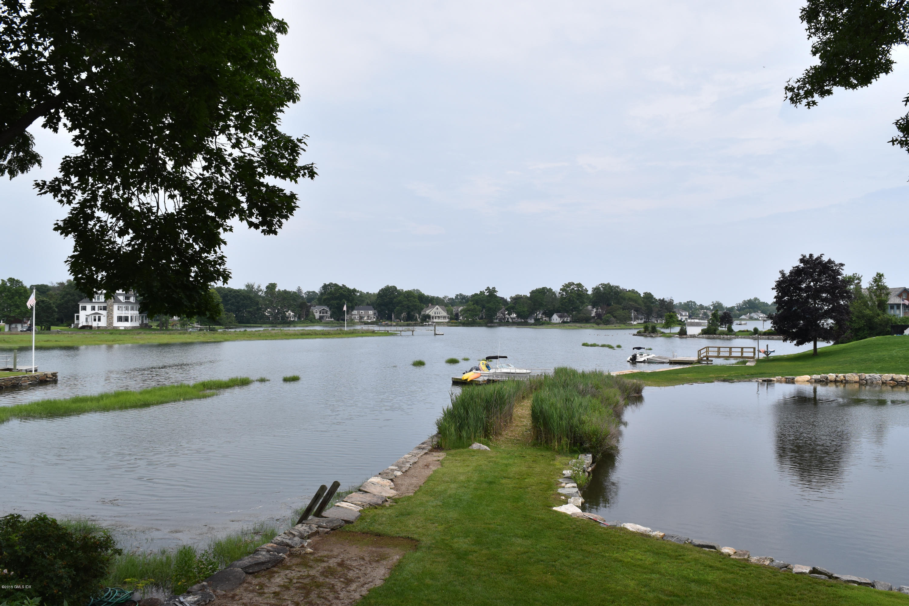 25 Willowmere Avenue Riverside, CT 06878 - Photo 11 of 12 a view of lake with green space