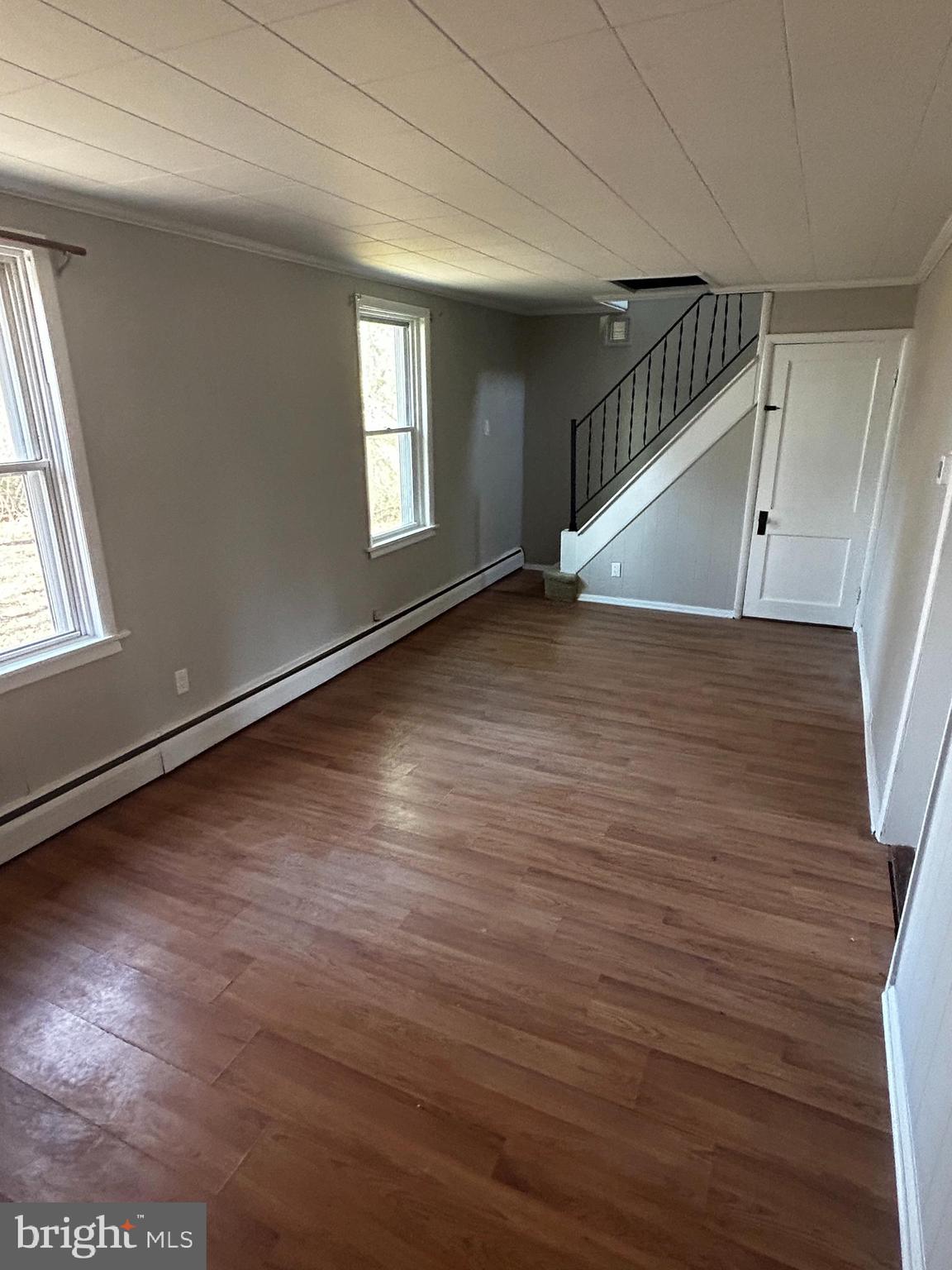 10 Boraten Road Royersford, PA 19468 - Photo 4 of 11 an empty room with wooden floor and windows