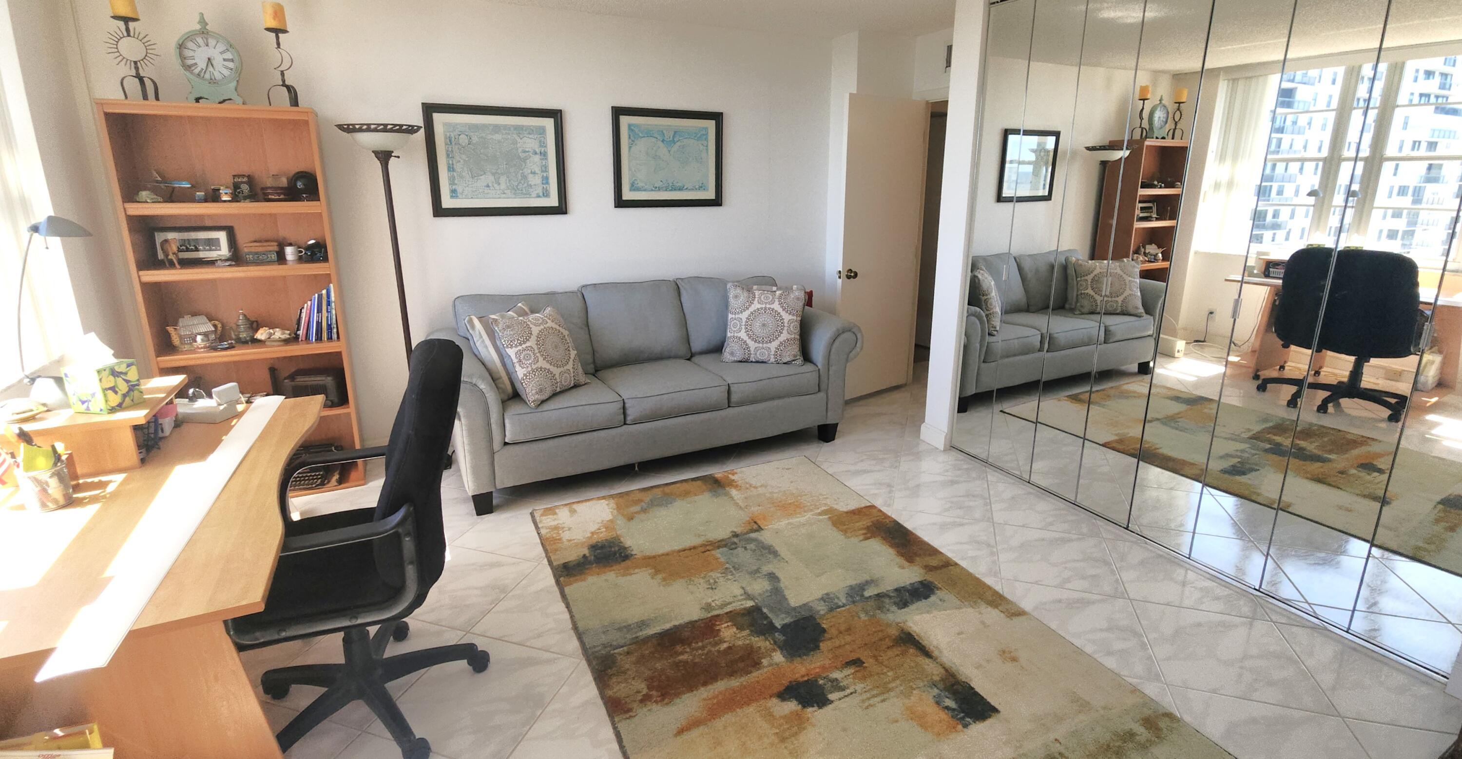 2121 North Ocean Boulevard, Unit 1205E Boca Raton, FL 33431 - Photo 22 of 54 a living room with furniture and a couch