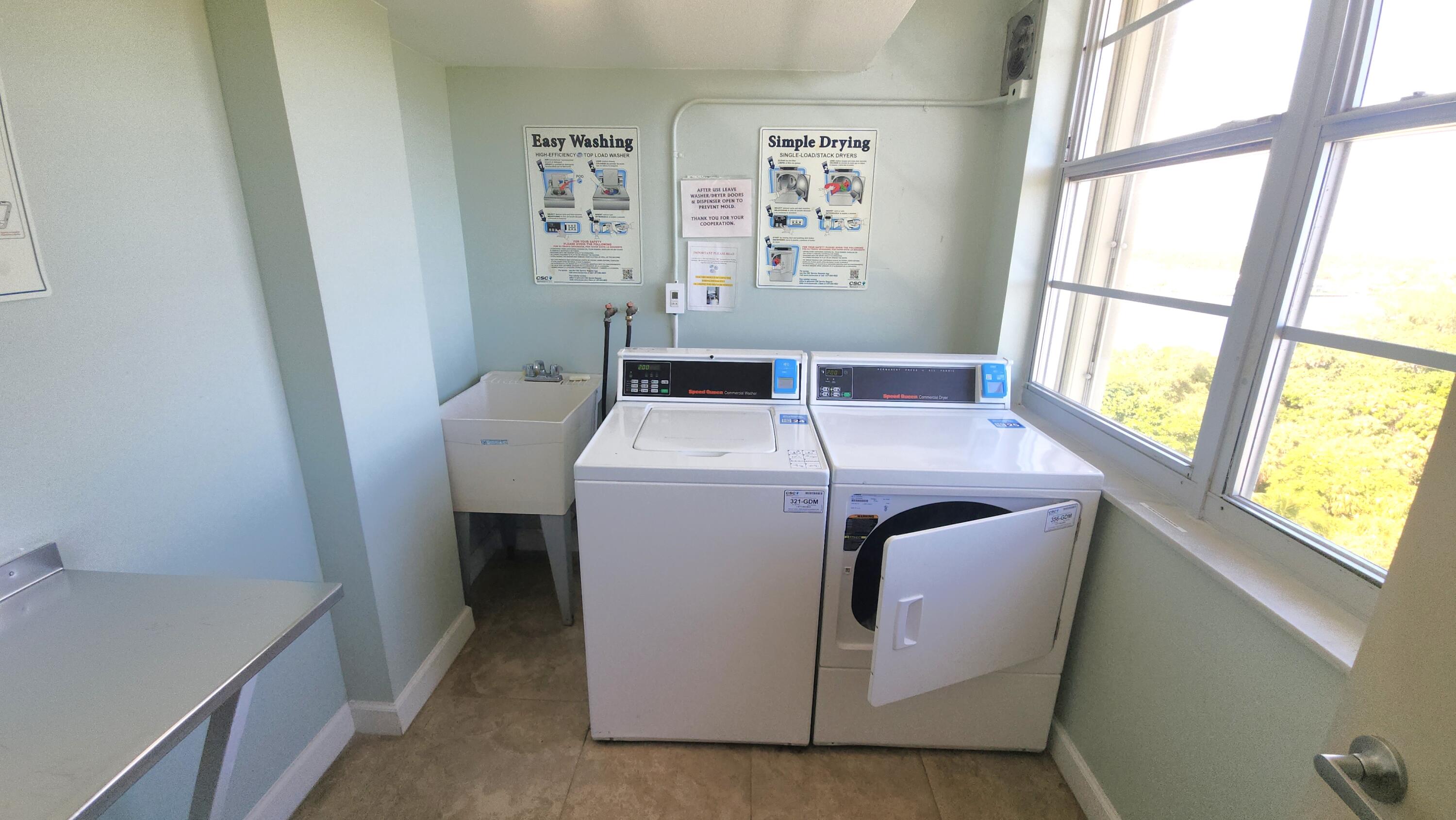 2121 North Ocean Boulevard, Unit 1205E Boca Raton, FL 33431 - Photo 26 of 54 a utility room with dryer and washer