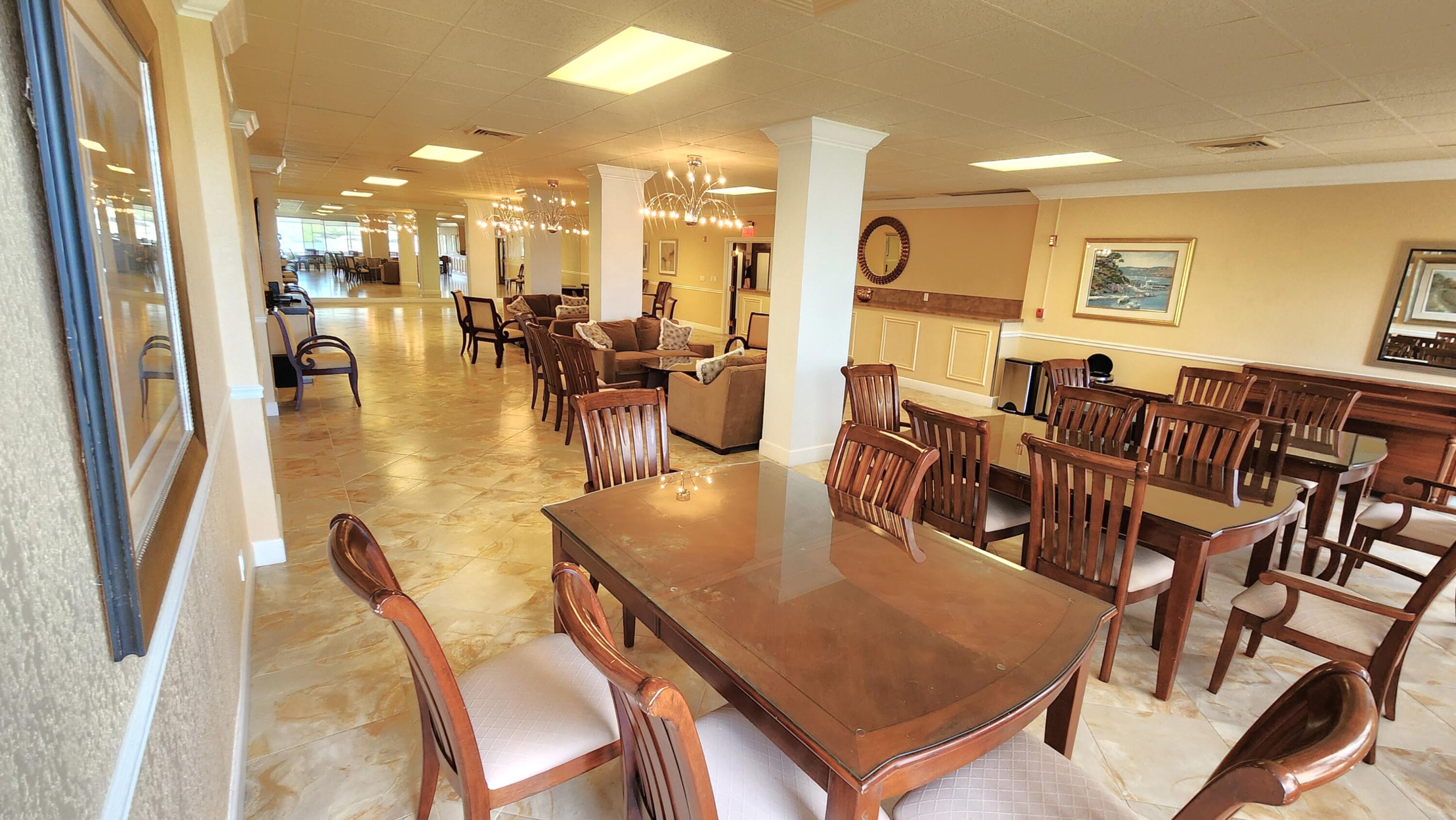 2121 North Ocean Boulevard, Unit 1205E Boca Raton, FL 33431 - Photo 34 of 54 a view of a dining room with furniture