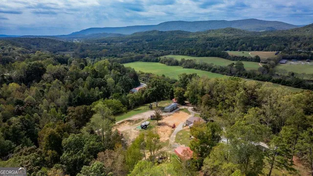 an aerial view of residential house with outdoor space