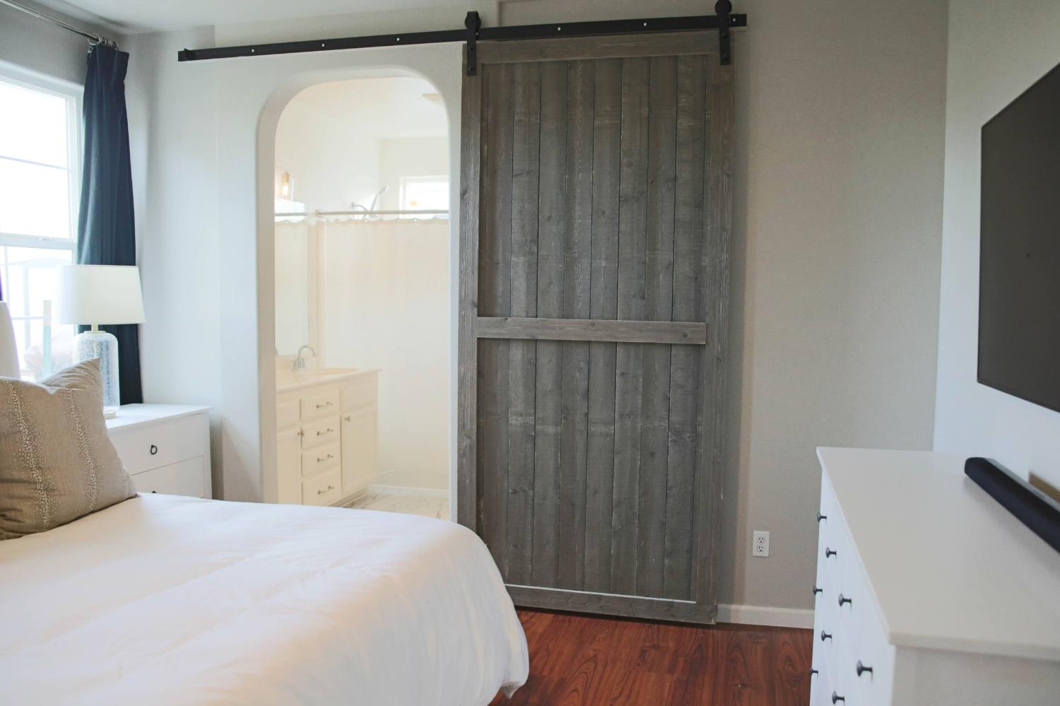 12372 Pawcatuck Way Rancho Cordova, CA 95742 - Photo 16 of 48 a bedroom with a bed and a window