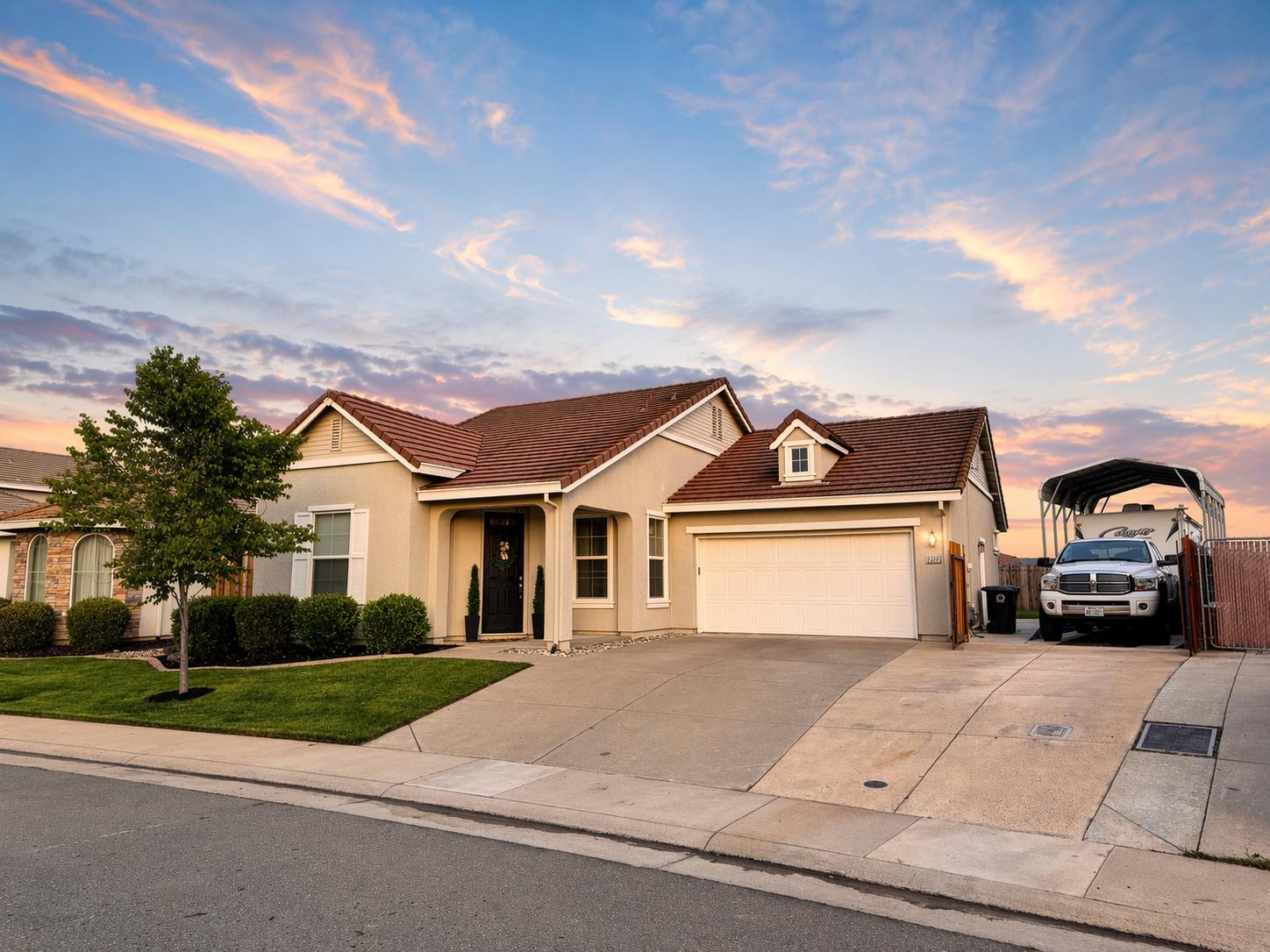 12372 Pawcatuck Way Rancho Cordova, CA 95742 - Photo 4 of 48 a view of a car parked in front of a house