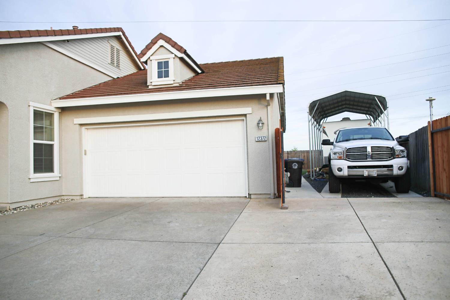 12372 Pawcatuck Way Rancho Cordova, CA 95742 - Photo 43 of 48 a view of a car garage