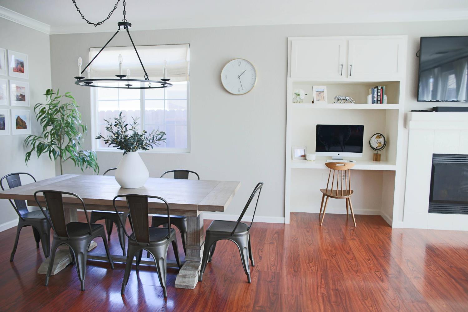 12372 Pawcatuck Way Rancho Cordova, CA 95742 - Photo 10 of 48 a view of a dining room with furniture wooden floor and a chandelier
