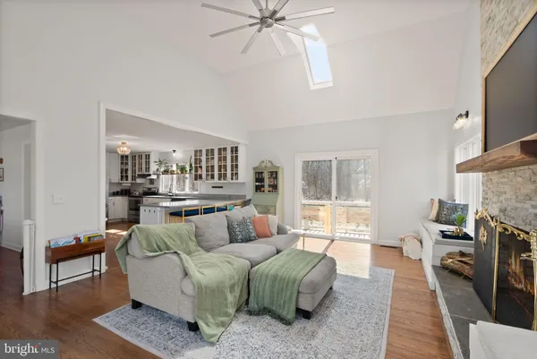 a room with furniture and wooden floor