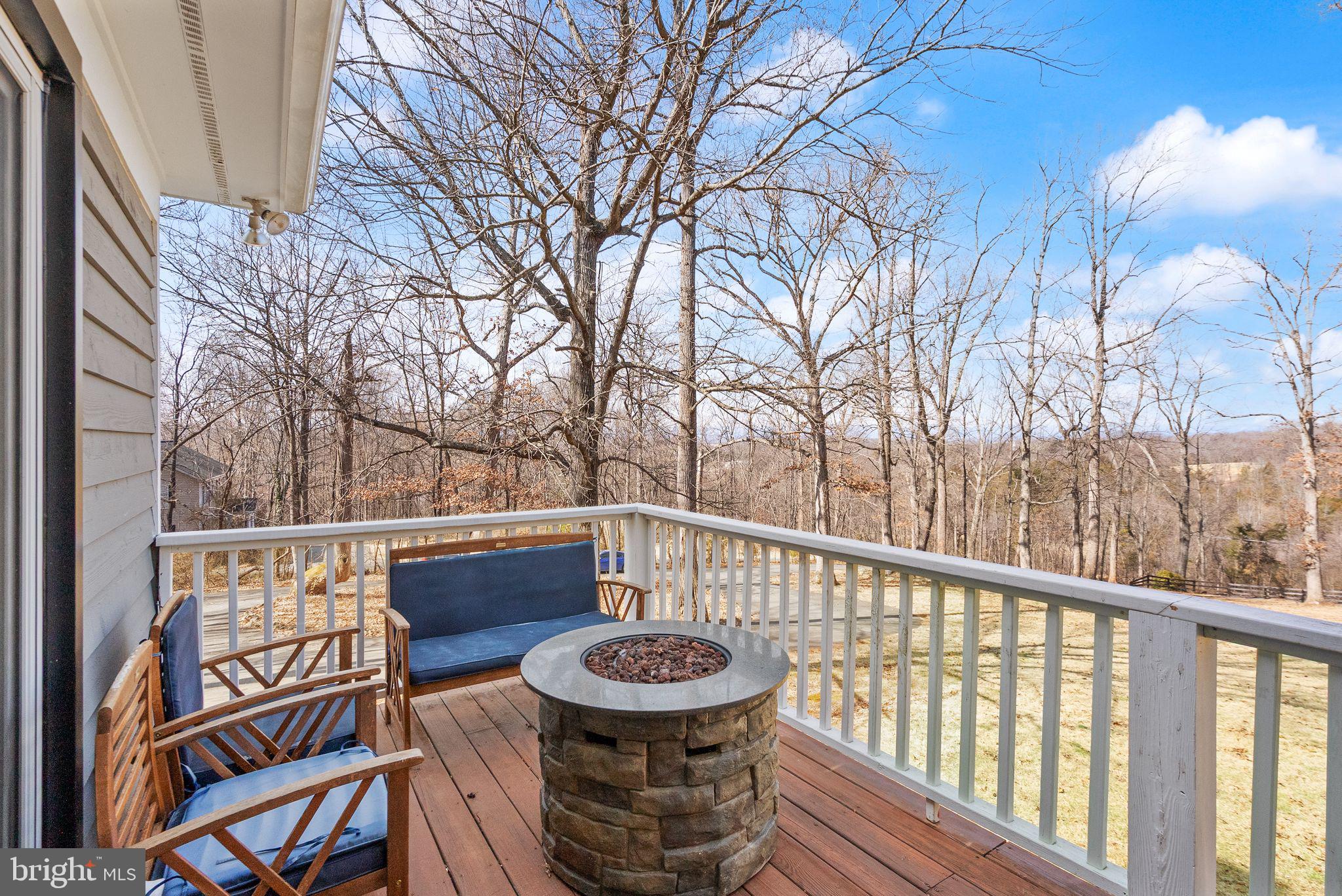 8089 Moormont Road Rapidan, VA 22733 - Photo 20 of 88 a view of a chairs and table on the deck