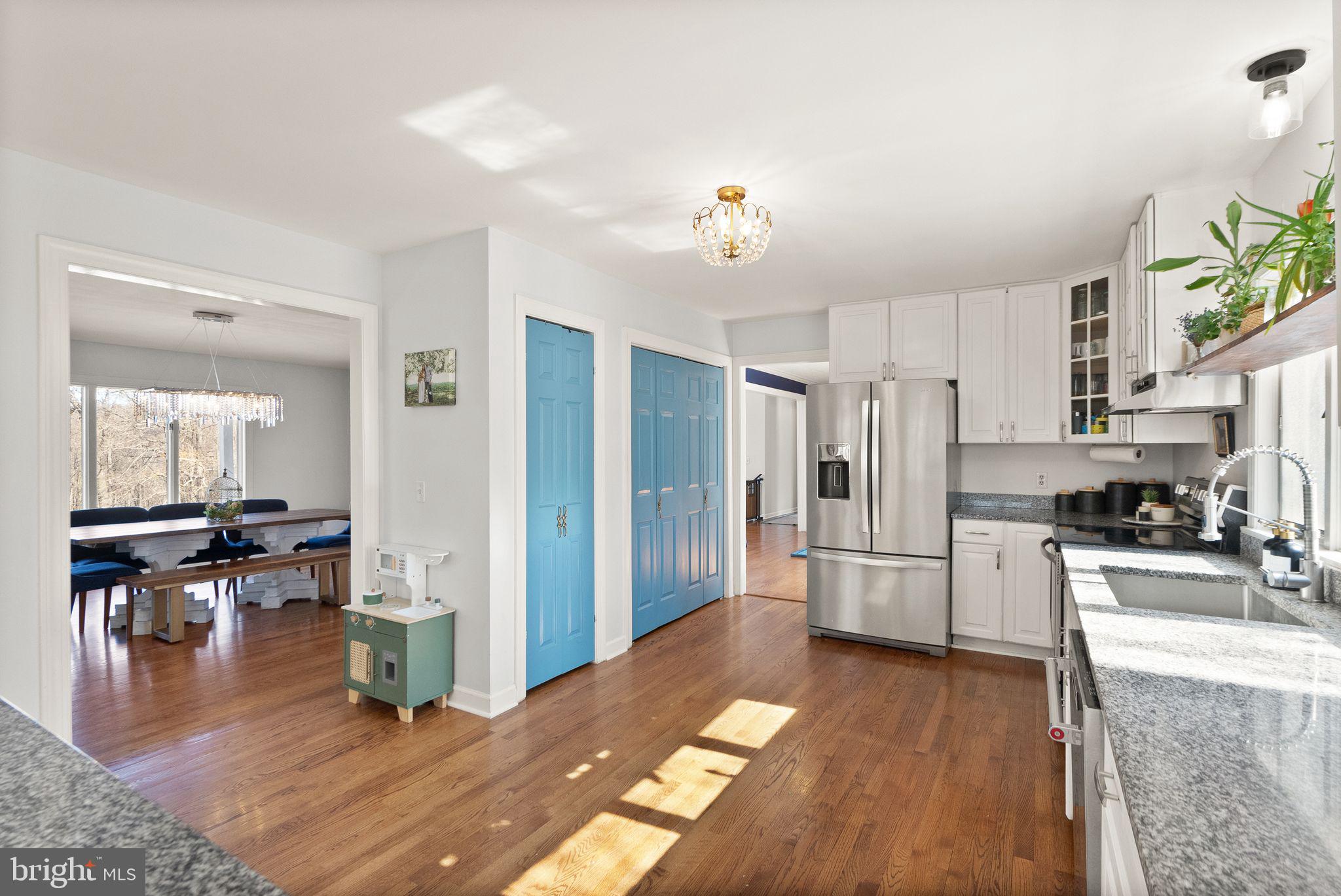 8089 Moormont Road Rapidan, VA 22733 - Photo 21 of 88 a kitchen with stainless steel appliances granite countertop a refrigerator and a stove top oven