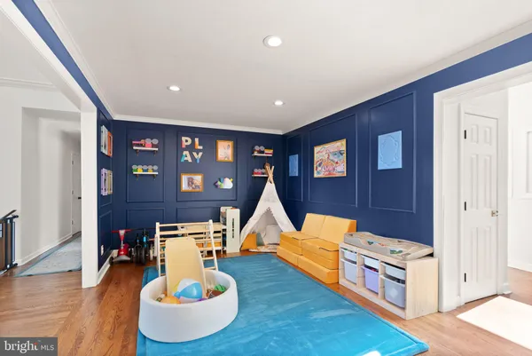 a bathroom with a toilet and a sink