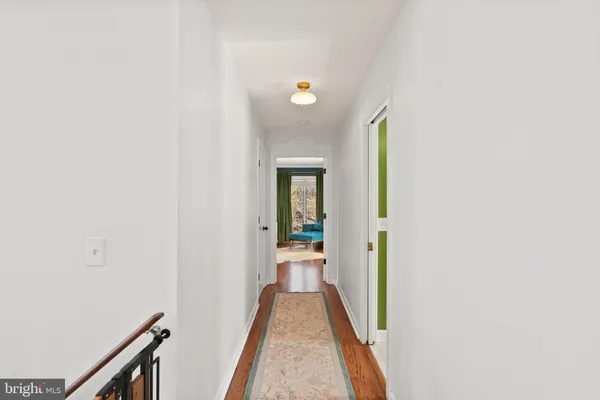 a view of a livingroom with wooden floor